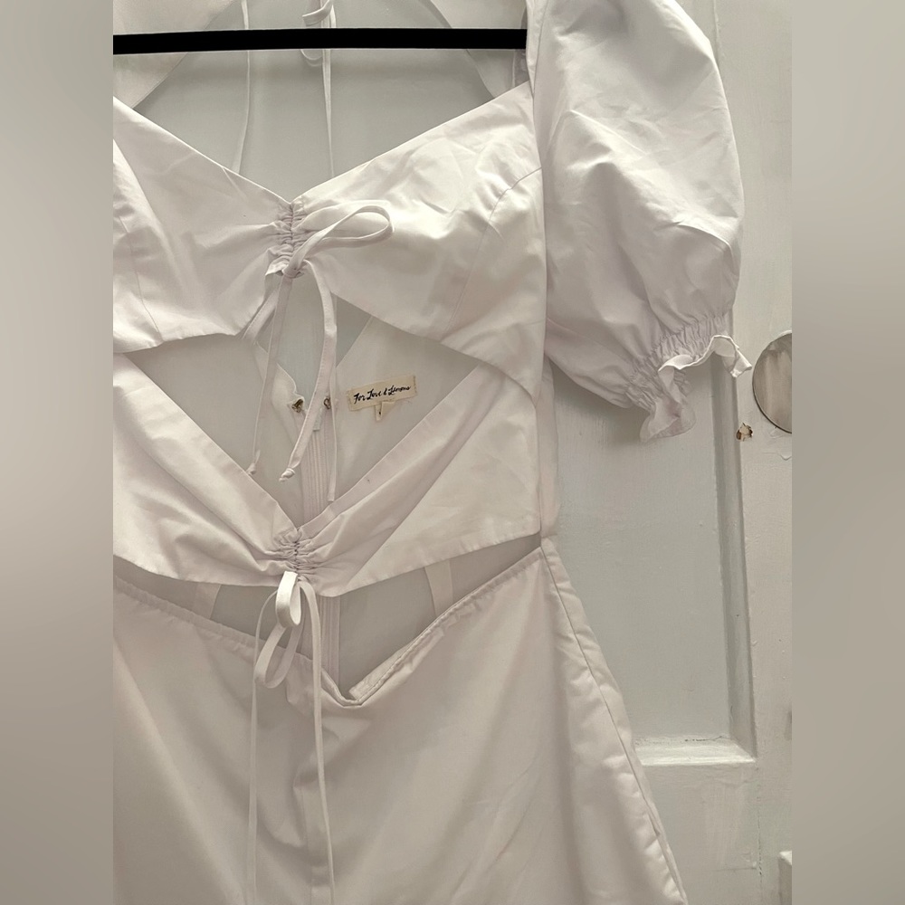 For Love and Lemons white cutout romper with puff sleeves. Size small. - Picture 5 of 5